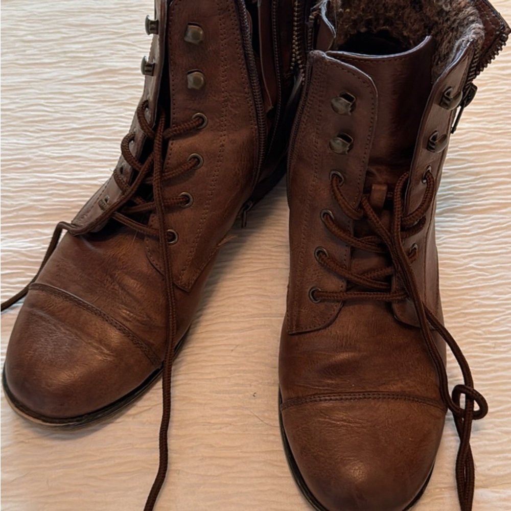 Brown leather combat boots